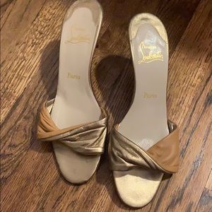 Excellent condition Louboutin mules. Gold and tan